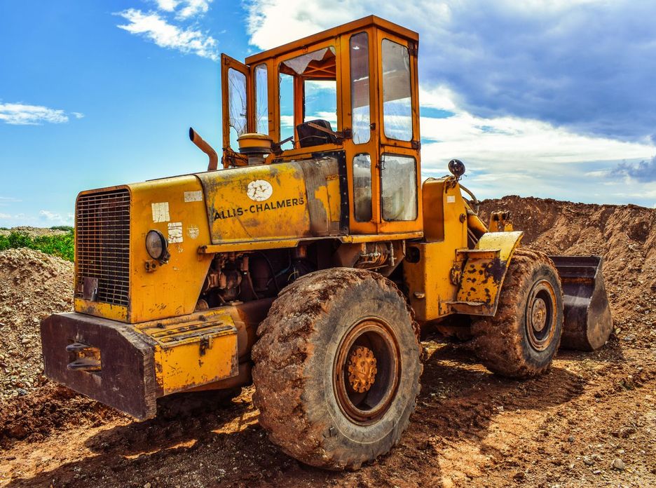 A yellow bulldozer on a construction site
